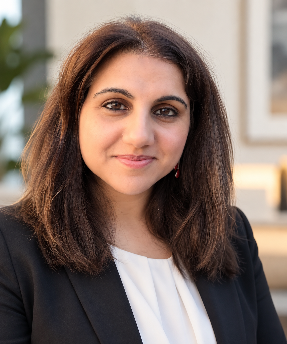 Ridhima Iyer, MD MPH in a black blazer